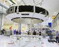 Orion Crew Module Adapter Lifted in Processing Facility at NASA's Kennedy Space Center