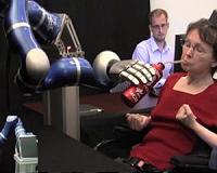 In a first, brain computer interface helps paralyzed man feel again