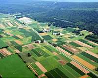 When surrounding farms get hot and dry, cities cool off