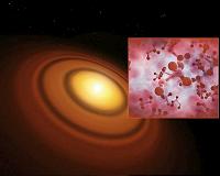 First Detection of Methyl Alcohol in a Planet-forming Disc
