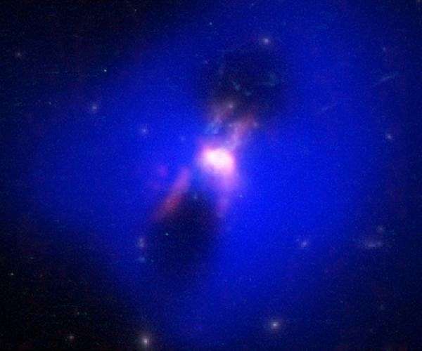 Can black hole fire up cold heart of the Phoenix