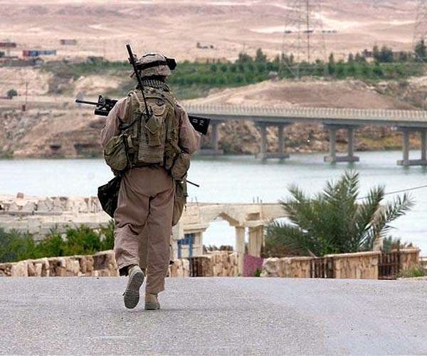Iraq, US agree phased coalition troop pullout: minister