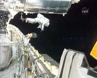 Astronauts assemble Canadian robot on 7-hour walk