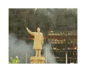 April 9, 2003: A statue, a bridge, and a city, fall