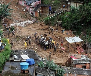 Five dead, dozens buried in Indonesia landslide