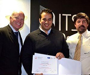 Work on automatic control of driverless vehicles through intersections receives recognition
