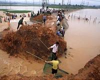 Three dead in China rain storms: government