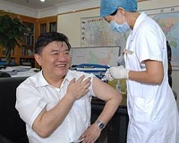 China sacks regional officials as vaccine scandal mounts