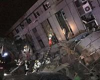 Rescuers brave aftershocks as Taiwan quake toll rises to nine