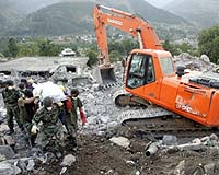 Bulldozers Move In As Quake Rescue Teams Face Grim Truth