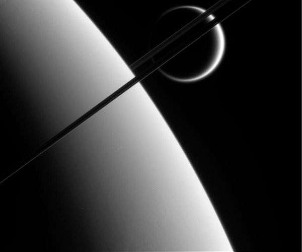Titan may have formed in a giant impact between ancient Saturn moons