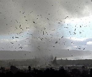 Mini-twister smashes through Australian town