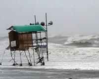 Strong typhoon barrels towards flood-hit western Japan