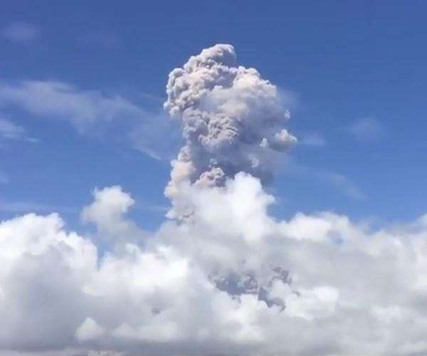 Philippines on alert as volcano spews ash