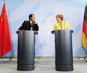China, Germany ink billions in deals, differ on rights